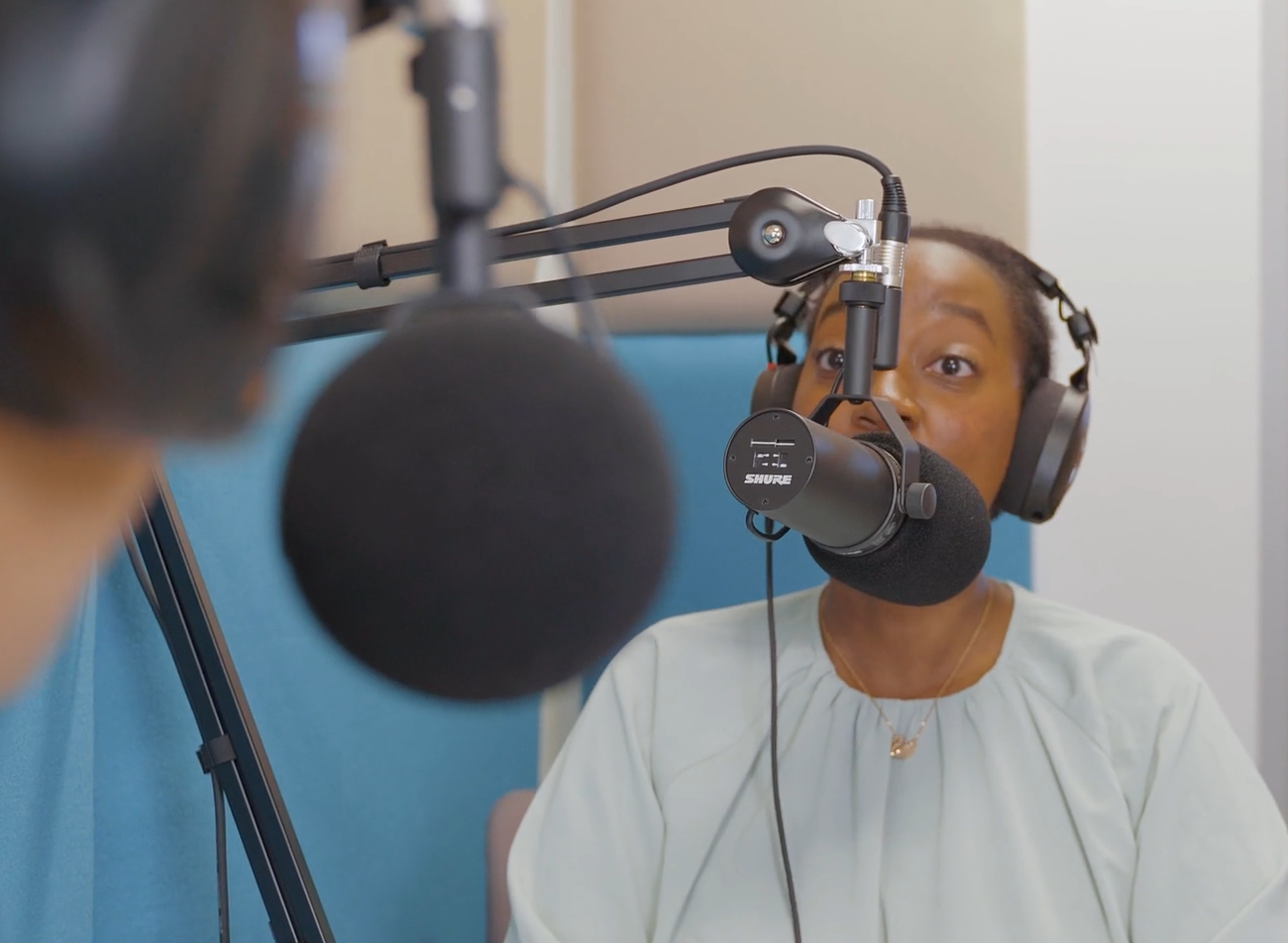 people in podcast room