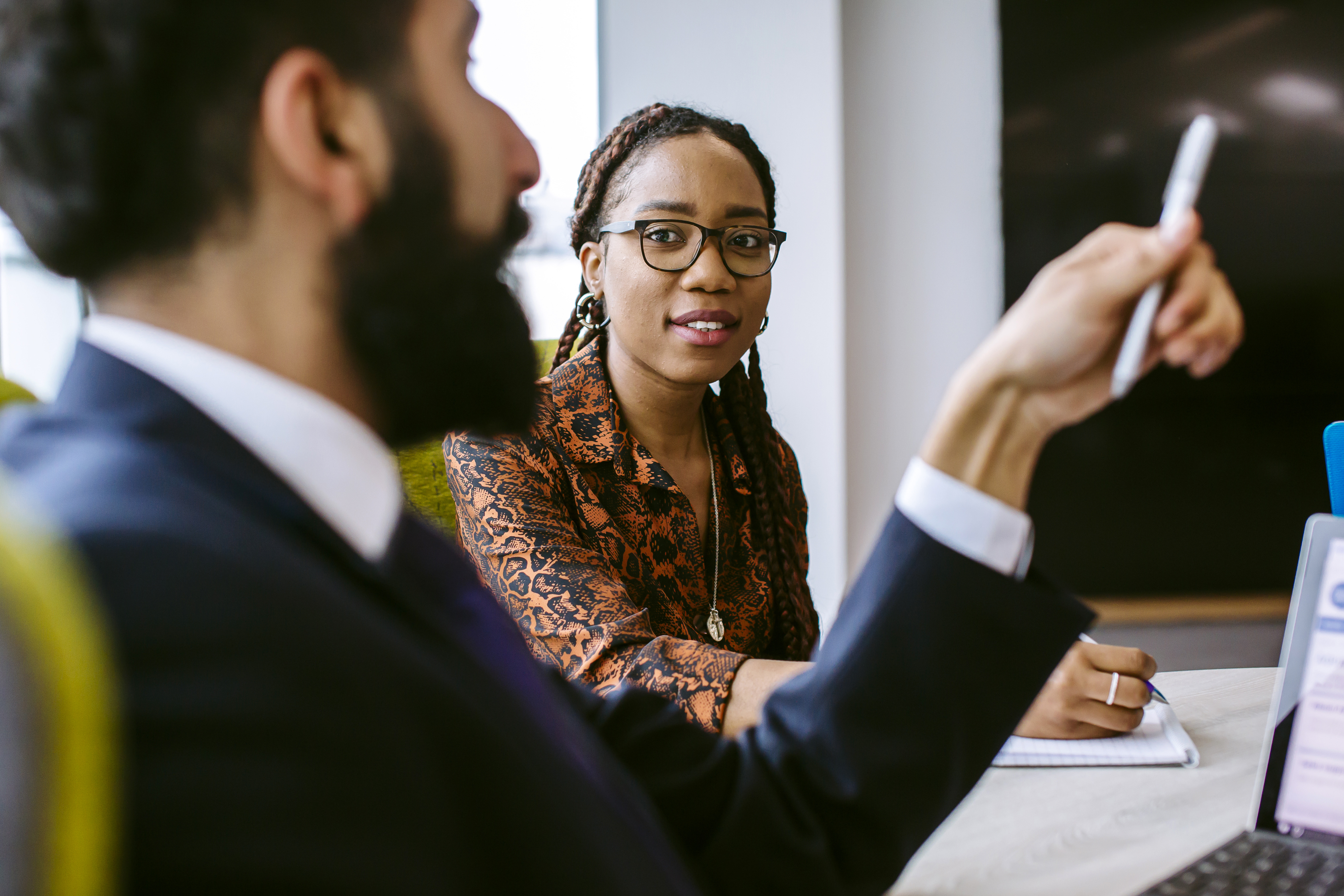 man and woman at a desk