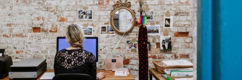 Woman in cell block office